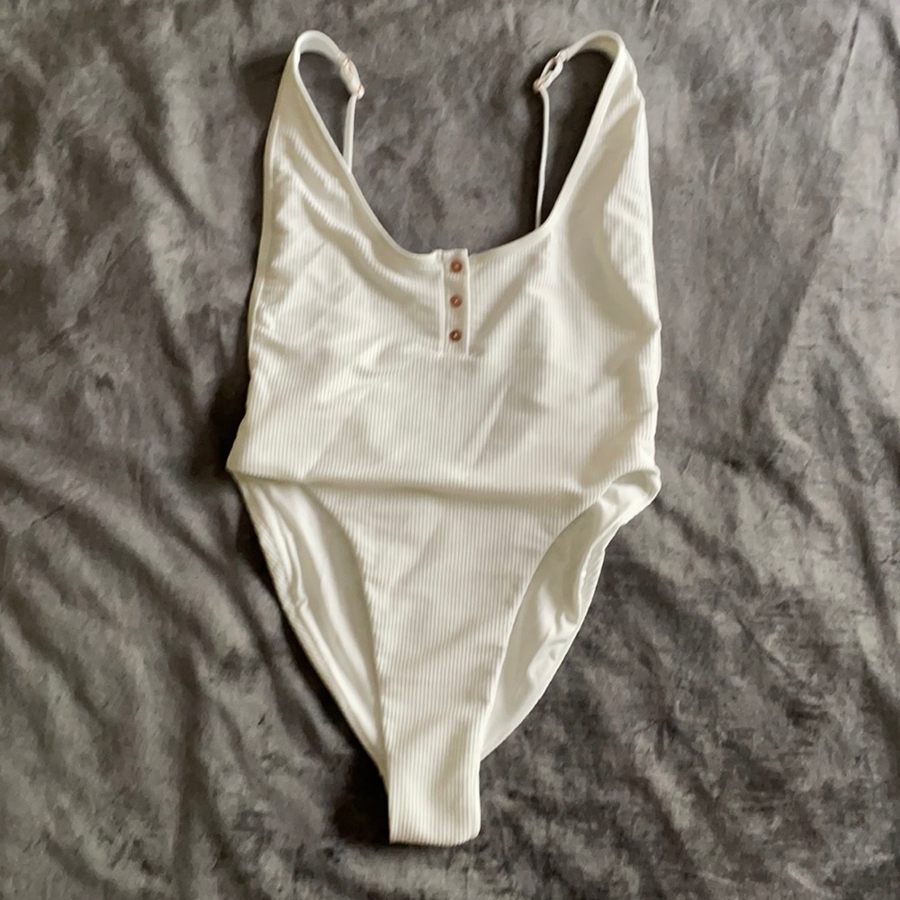 Frankie’s Bikinis white one-piece swimsuit